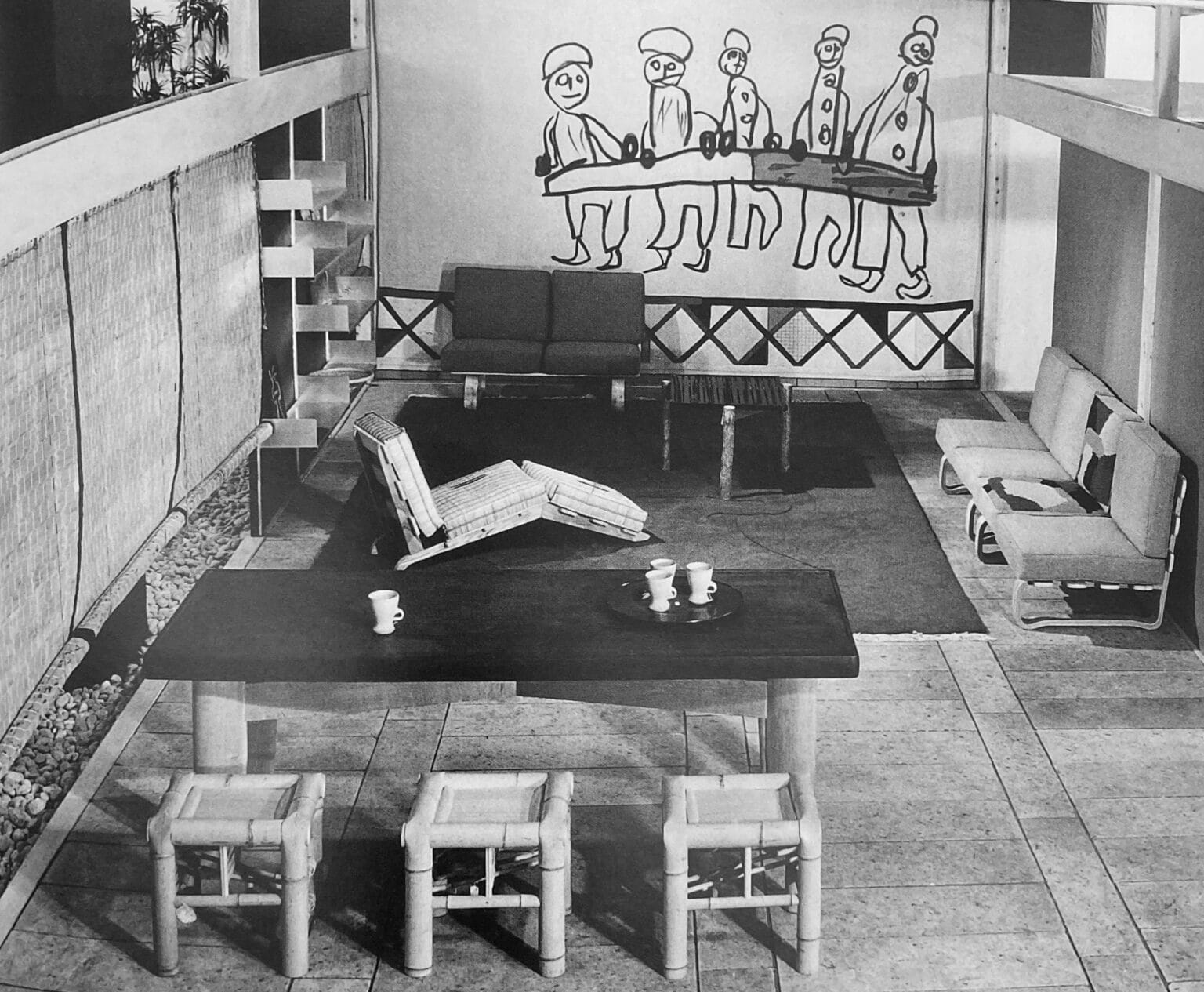 Photograph of the dining room-living room on a stony floor at the tokyo exhibition, march-april 1941